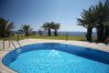 Generous garden of luxury beach front Sea Caves villa Prestige, Cyprus
