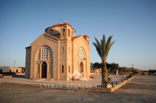 Church of St George on Mediterranean coast in Peyia during a sunset, Cyprus