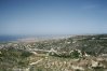 Kamares Village on the hill slopes over Mediterranean coast in Cyprus